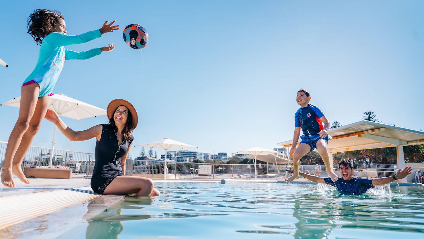 Family in Kings Beach Ocean Pool, Caloundra