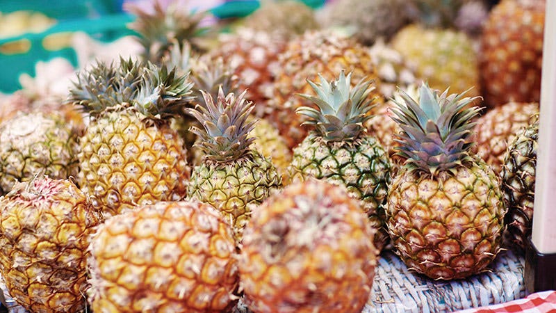 Basket of pineapples at the markets